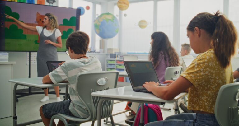 Elementary,School,Children,Drawing,Pictures,On,Laptops,During,Digital,Art